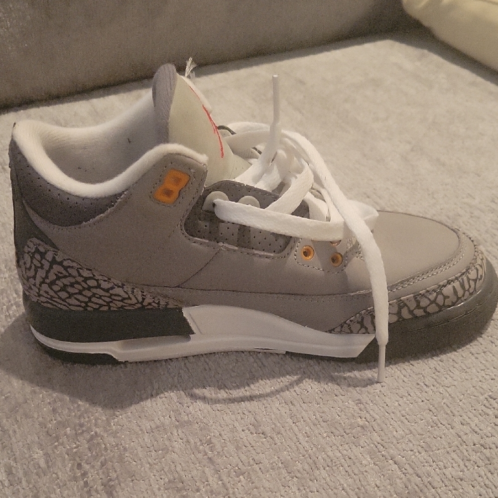 Nike Gray and Orange Sneakers with Signature Design